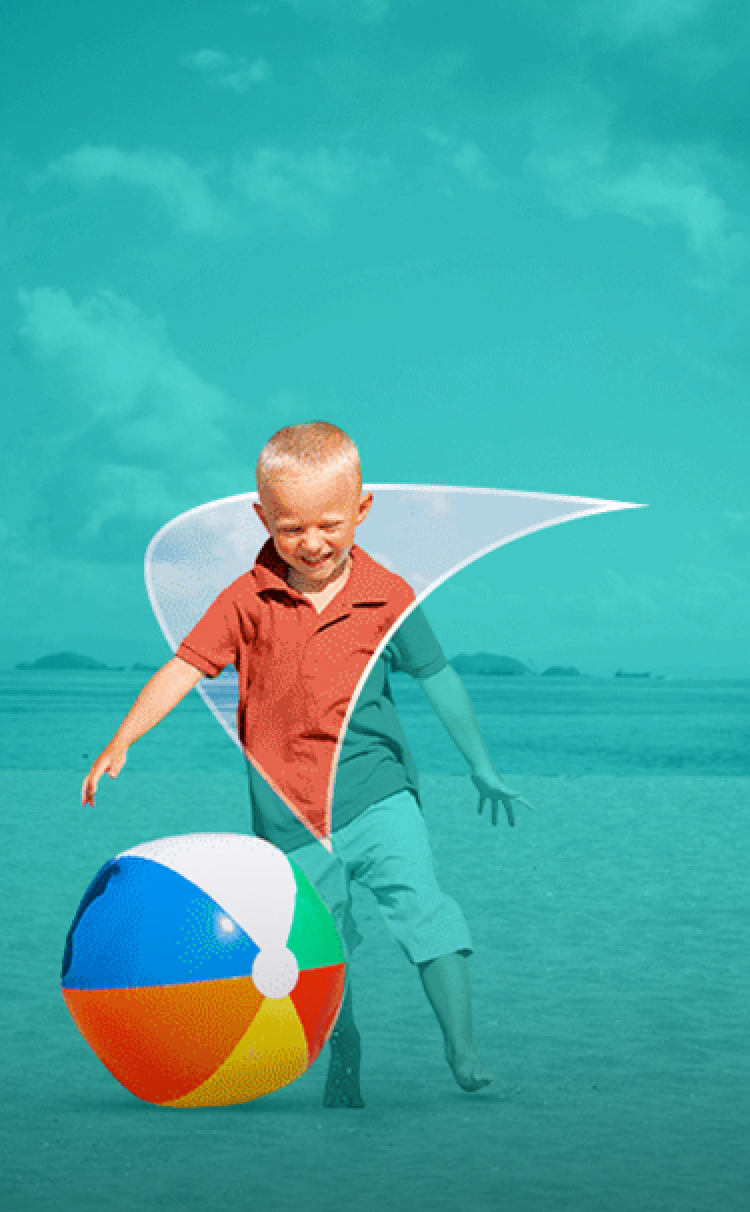 Picture of a little boy playing with a beach ball. A liver shape appears behind him.