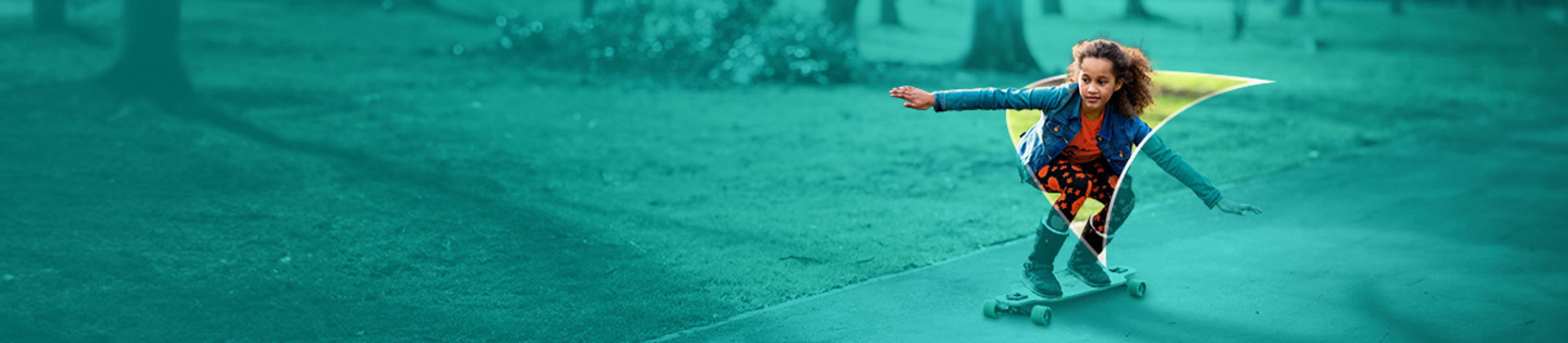 Picture of a young girl skateboarding. A liver shape appears behind her.
