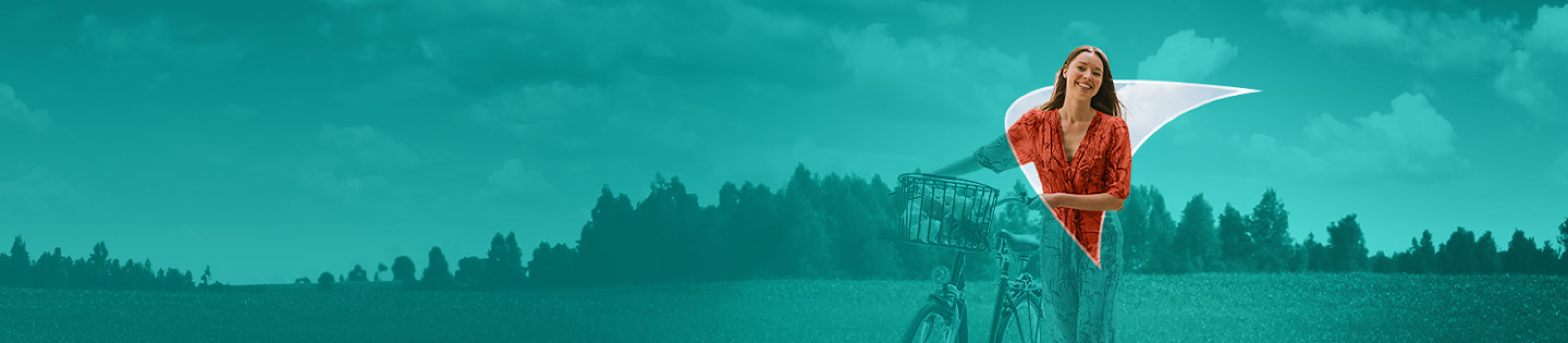 Picture of a young woman walking while holding on to a bike.