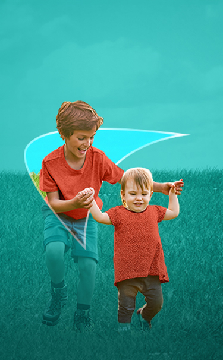Picture of a little boy holding a toddler’s arms and helping him walk. A liver shape appears behind them.